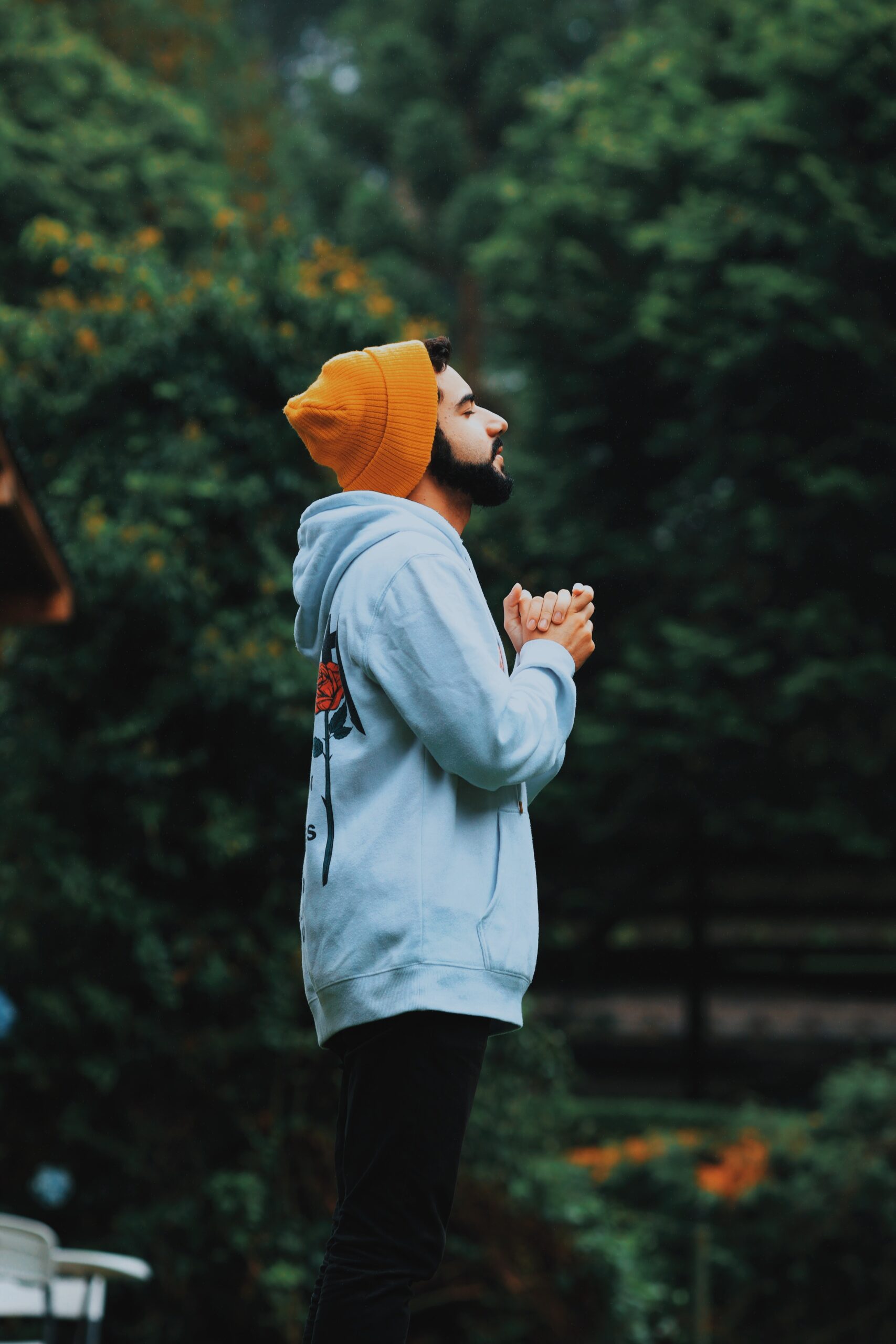 Daily Joke: Man Leaving a Cemetery Notices Another Man Kneeling at a Grave